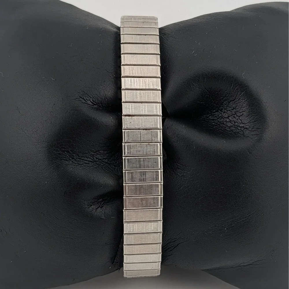 Avon silver tone
